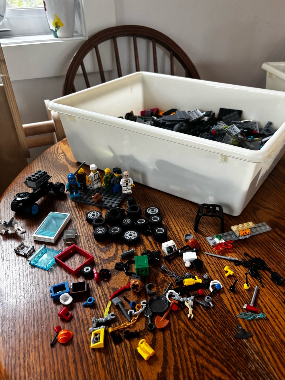 Legos with mini figures and accessories with bin